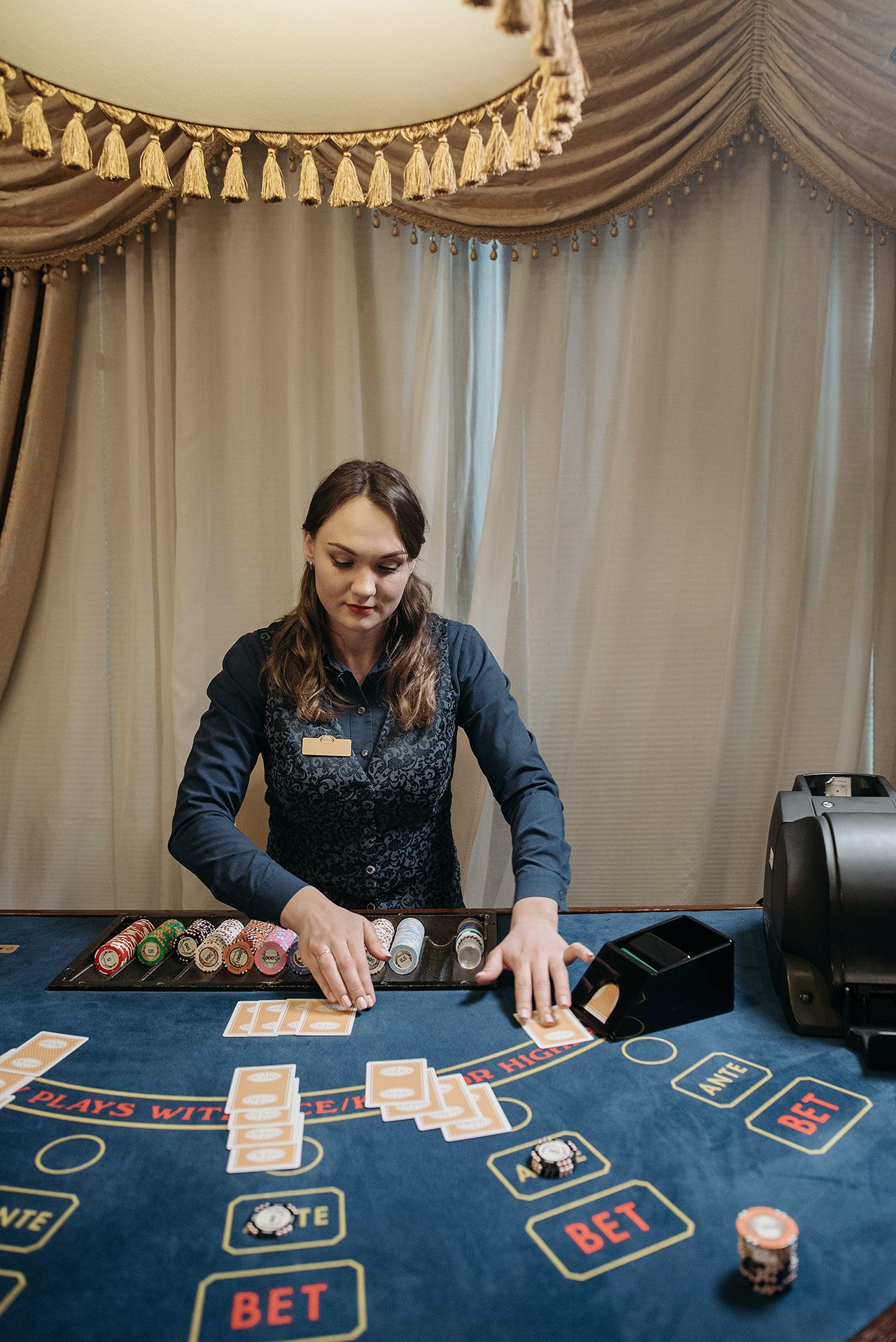 female croupier giving cards