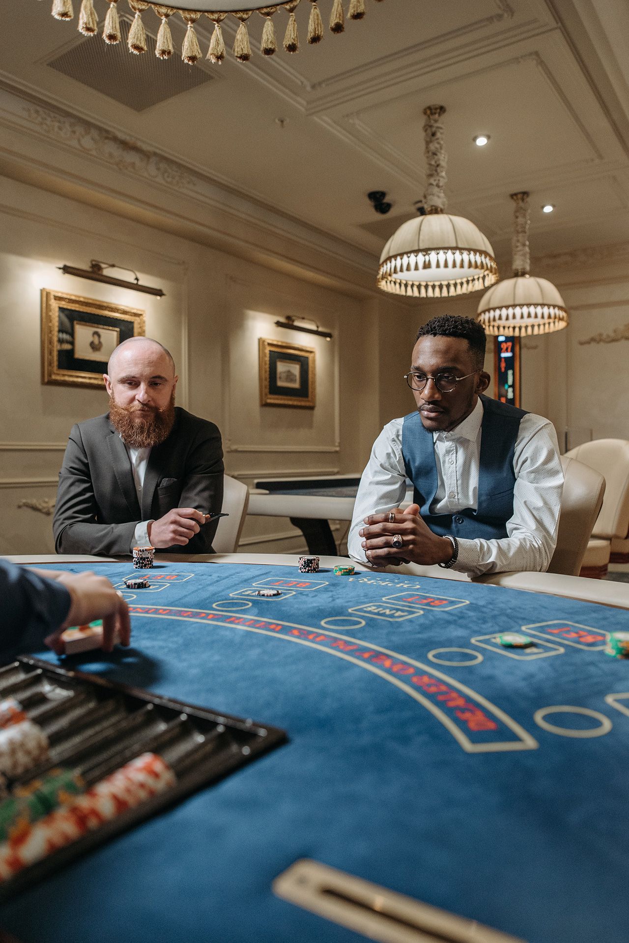 people playing table games in casino
